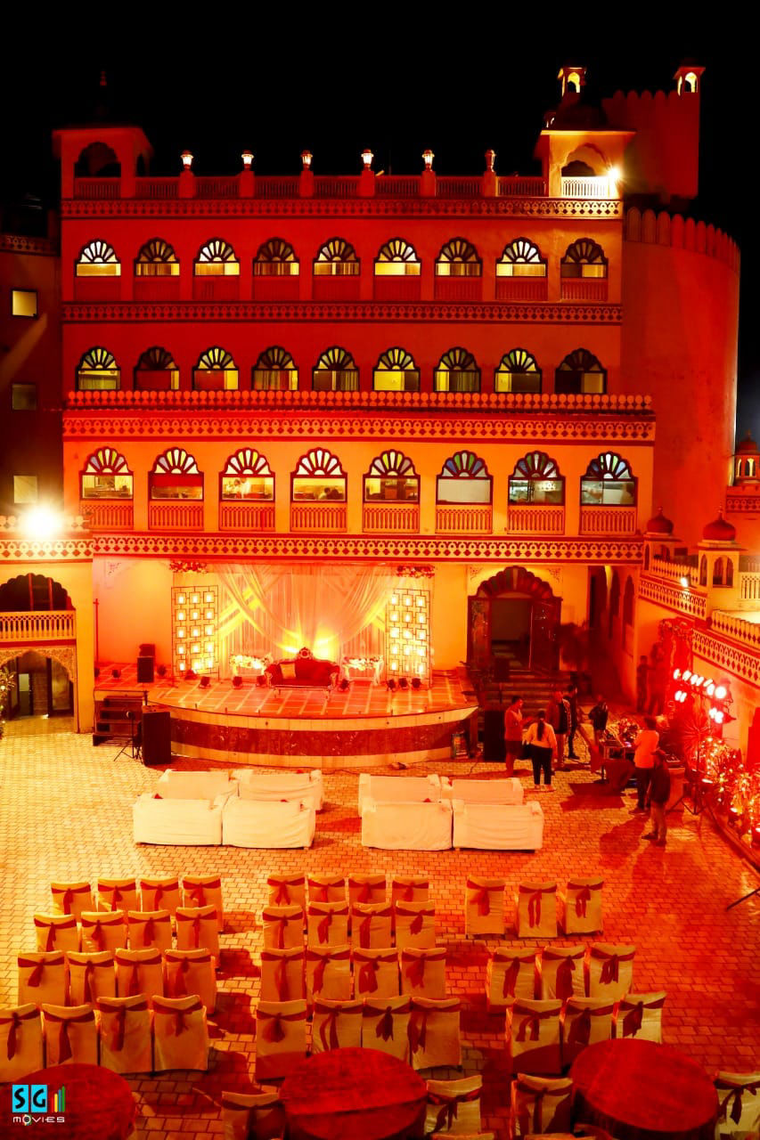Aerial night view of banquet hall wedding stage at Fort Chandragupt Hotel Jaipur