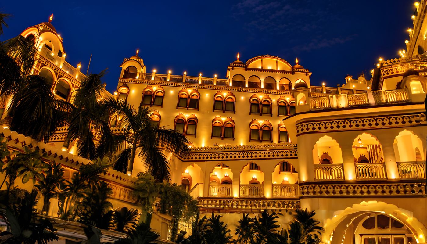 Fort Chandragupt Hotel exterior illuminated at night, Jaipur